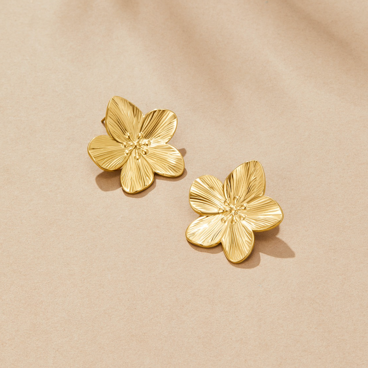 Pendientes de flores doradas
