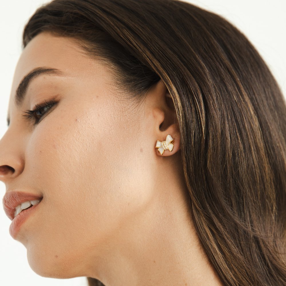 Pendientes de lazo blanco cristalino