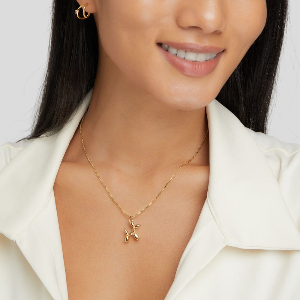 Collar de Bola Dorada con Forma de Animal